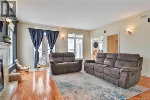 9 Heron Court, Bouctouche, NB - Indoor Photo Showing Living Room With Fireplace