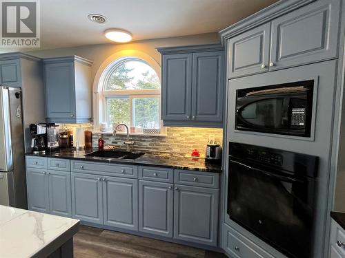 26-28 Boyd Avenue, Clarkes Beach, NL - Indoor Photo Showing Kitchen With Double Sink