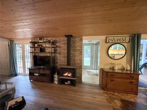 676 Turner Rd, Parksville, BC - Indoor Photo Showing Other Room With Fireplace