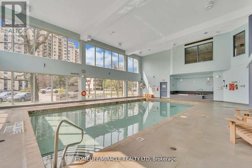 #709 -65 Ellen St, Barrie, ON - Indoor Photo Showing Other Room With In Ground Pool