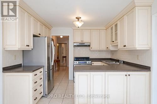 4121 Colfax Crt, Mississauga, ON - Indoor Photo Showing Kitchen With Double Sink