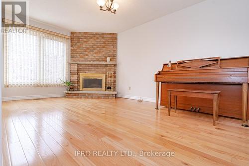 4121 Colfax Crt, Mississauga, ON - Indoor Photo Showing Living Room With Fireplace