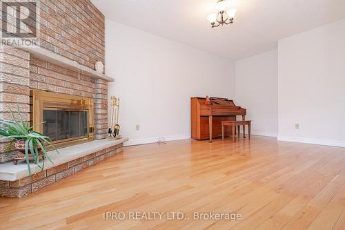 4121 Colfax Crt, Mississauga, ON - Indoor Photo Showing Living Room With Fireplace