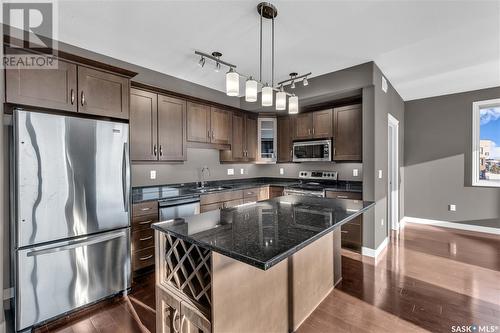 308 405 Cartwright Street, Saskatoon, SK - Indoor Photo Showing Kitchen With Upgraded Kitchen
