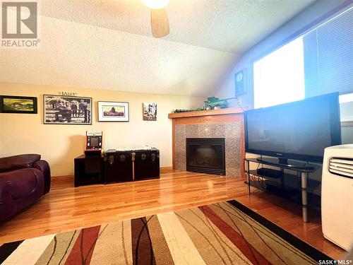32 Bence Beach, Pasqua Lake, SK - Indoor Photo Showing Other Room With Fireplace
