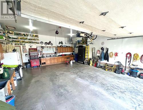 32 Bence Beach, Pasqua Lake, SK - Indoor Photo Showing Garage