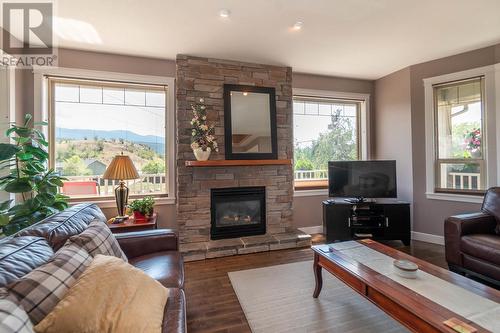 553 Mt. Ida Drive, Coldstream, BC - Indoor Photo Showing Living Room With Fireplace