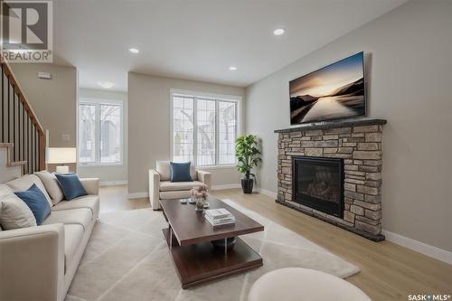 1112 9Th Street E, Saskatoon, SK - Indoor Photo Showing Living Room With Fireplace