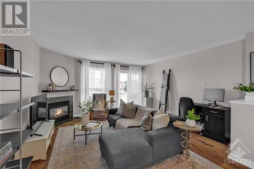 840 Longfields Drive, Nepean, ON - Indoor Photo Showing Living Room With Fireplace