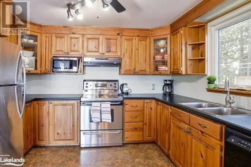 1378 Three Mile Lake Road Unit# 3, Muskoka Lakes, ON - Indoor Photo Showing Kitchen With Double Sink