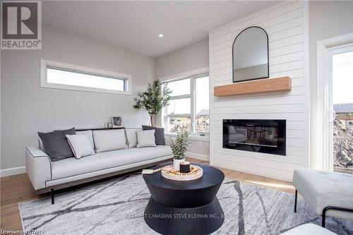 #101 -2700 Buroak Dr, London, ON - Indoor Photo Showing Living Room With Fireplace