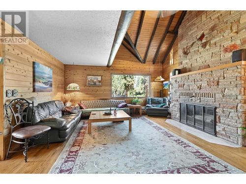 4610 Stewart Road E, Kelowna, BC - Indoor Photo Showing Living Room With Fireplace