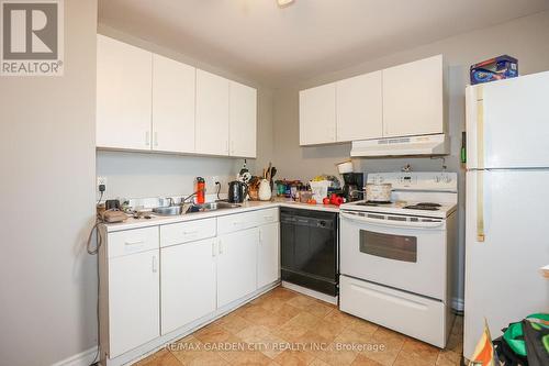 21 Trapnell St, St. Catharines, ON - Indoor Photo Showing Kitchen With Double Sink