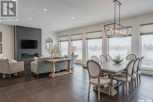 739 Beechdale Way, Saskatoon, SK - Indoor Photo Showing Dining Room With Fireplace