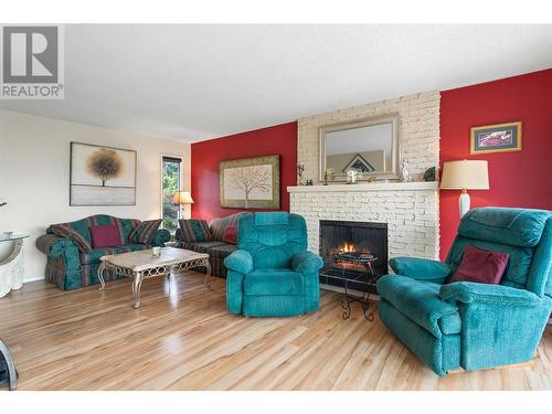 1340 Gibson Road, Kelowna, BC - Indoor Photo Showing Living Room With Fireplace