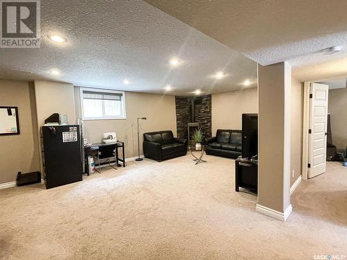 6 Morin Crescent, Meadow Lake, SK - Indoor Photo Showing Living Room With Fireplace