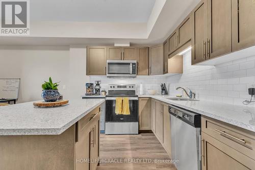 #412 -120 Summersides Blvd, Pelham, ON - Indoor Photo Showing Kitchen With Stainless Steel Kitchen With Upgraded Kitchen