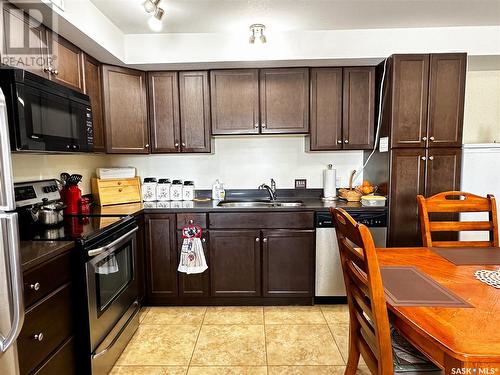 206 2322 Kildeer Drive, North Battleford, SK - Indoor Photo Showing Kitchen With Double Sink