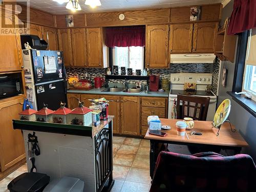 9 Maple Lane, Gander Bay, NL - Indoor Photo Showing Kitchen With Double Sink