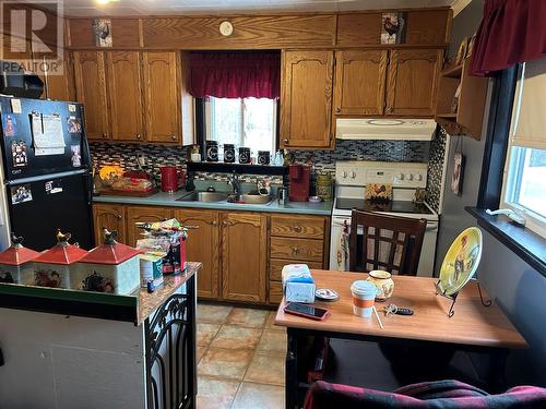 9 Maple Lane, Gander Bay, NL - Indoor Photo Showing Kitchen With Double Sink