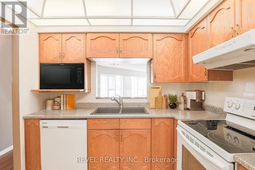 #204 -4 Heritage Way, Kawartha Lakes, ON - Indoor Photo Showing Kitchen With Double Sink