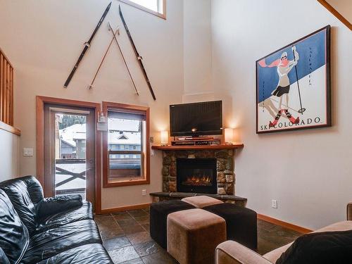 8-360 Strayhorse Road, Apex Mountain, BC - Indoor Photo Showing Living Room With Fireplace