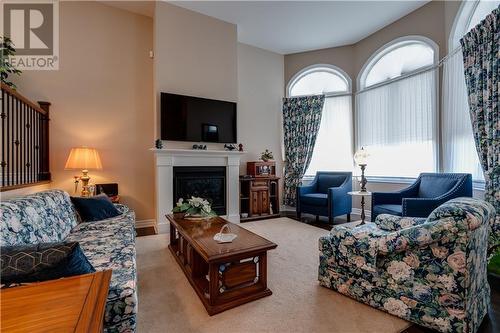 13 Eleanor Drive, Long Sault, ON - Indoor Photo Showing Living Room With Fireplace