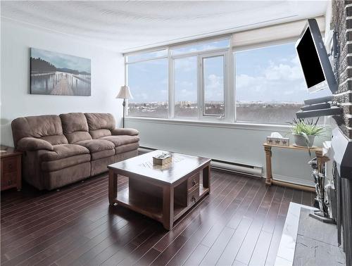 North Views of the Lake & Toronto Skyline - 30 Harrisford Street|Unit #1001, Hamilton, ON - Indoor Photo Showing Living Room