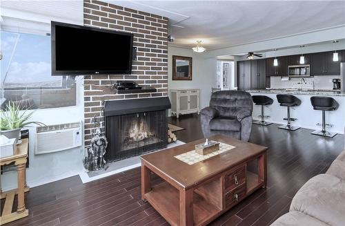 Open Concept - 30 Harrisford Street|Unit #1001, Hamilton, ON - Indoor Photo Showing Living Room With Fireplace