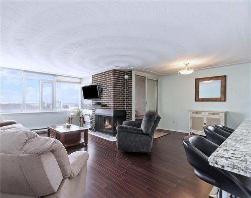 30 Harrisford Street|Unit #1001, Hamilton, ON - Indoor Photo Showing Living Room With Fireplace