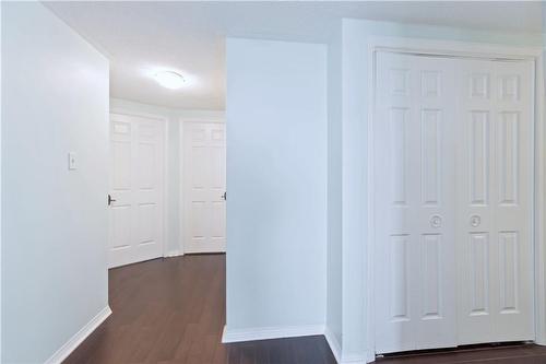 Hallway to Bedrooms with Hardwood Floors - 30 Harrisford Street|Unit #1001, Hamilton, ON - Indoor Photo Showing Other Room
