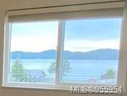306-7450 Rupert St, Port Hardy, BC - Indoor Photo Showing Other Room With Body Of Water
