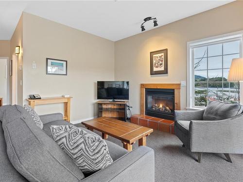 809-1971 Harbour Dr, Ucluelet, BC - Indoor Photo Showing Living Room With Fireplace