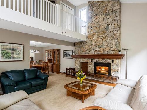 711 Clayton Rd, North Saanich, BC - Indoor Photo Showing Living Room With Fireplace