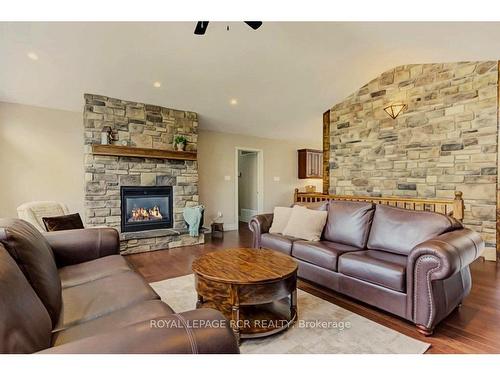 555374 Mono Amaranth Line, Amaranth, ON - Indoor Photo Showing Living Room With Fireplace