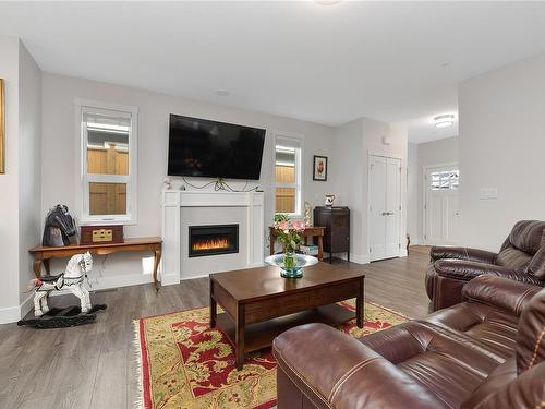 7-265 Caspian Dr, Colwood, BC - Indoor Photo Showing Living Room With Fireplace