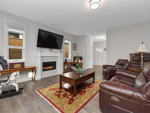 7-265 Caspian Dr, Colwood, BC - Indoor Photo Showing Living Room With Fireplace