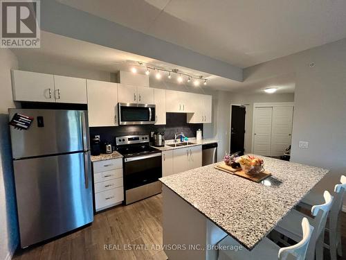 #318 -35 Kingsbury Sq, Guelph, ON - Indoor Photo Showing Kitchen With Stainless Steel Kitchen With Double Sink