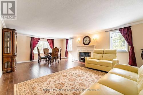 8681 Canyon Road, Milton, ON - Indoor Photo Showing Living Room With Fireplace