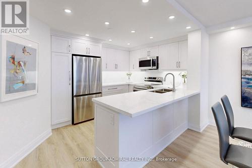 706 - 7460 Bathurst Street, Vaughan, ON - Indoor Photo Showing Kitchen With Double Sink With Upgraded Kitchen