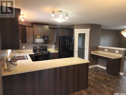 4801 Liberty Street, Regina, SK - Indoor Photo Showing Kitchen With Double Sink