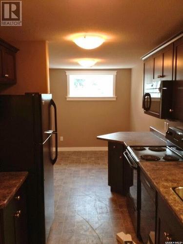 4801 Liberty Street, Regina, SK - Indoor Photo Showing Kitchen With Double Sink