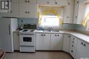 416 6Th Avenue W, Assiniboia, SK  - Indoor Photo Showing Kitchen With Double Sink 