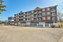 95 Wilson Street W|Unit #204, Ancaster, ON  - Outdoor With Balcony With Facade 