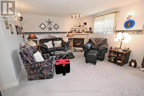 255 Miller Rd, Dutton/Dunwich, ON - Indoor Photo Showing Living Room With Fireplace