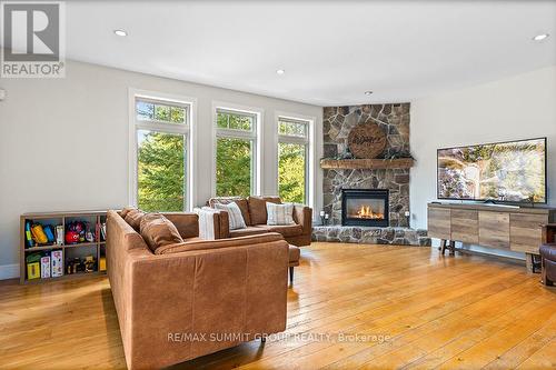 123 Inglis Drive, Grey Highlands, ON - Indoor Photo Showing Living Room With Fireplace