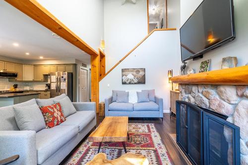 14 - 5423 Boomerang Way, Fernie, BC - Indoor Photo Showing Living Room With Fireplace