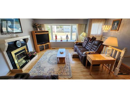 7713 Thompson Drive, Prince George, BC - Indoor Photo Showing Living Room With Fireplace