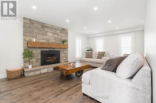 4896 5Th Line, New Tecumseth, ON - Indoor Photo Showing Living Room With Fireplace