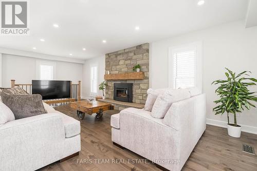 4896 5Th Line, New Tecumseth, ON - Indoor Photo Showing Living Room With Fireplace